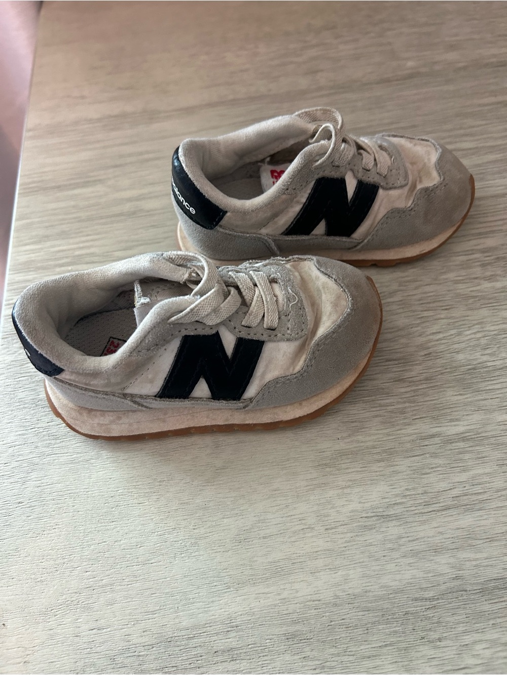 New Balance Kids Light Gray and Black Suede Sneakers